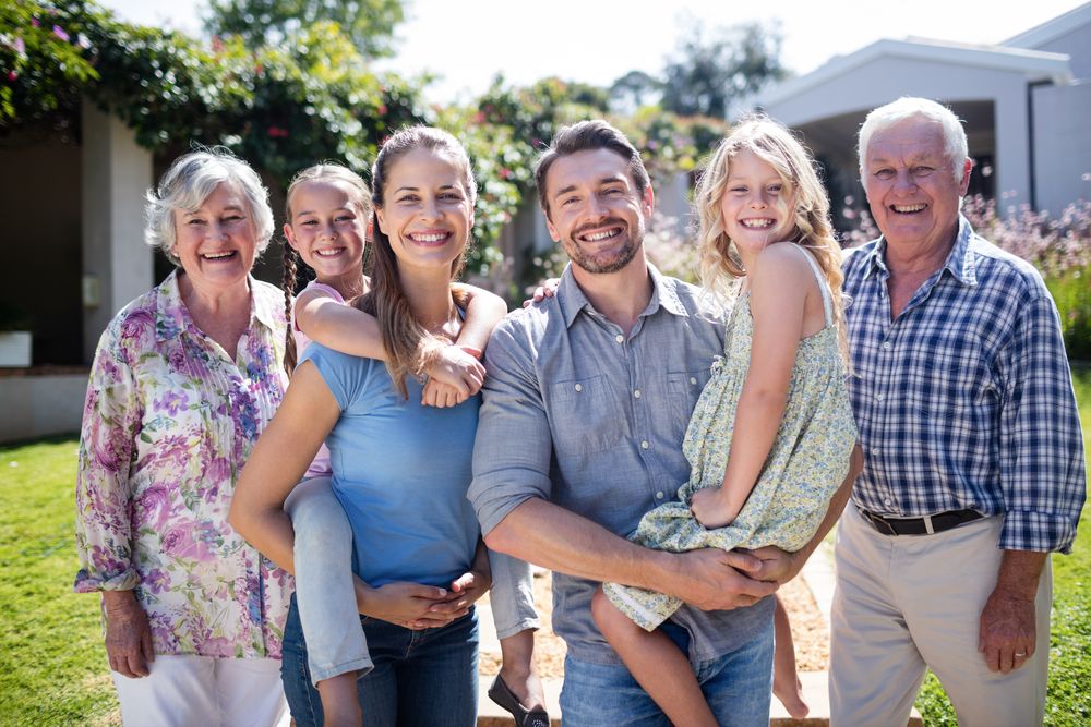 Three generations of a family together outdoors